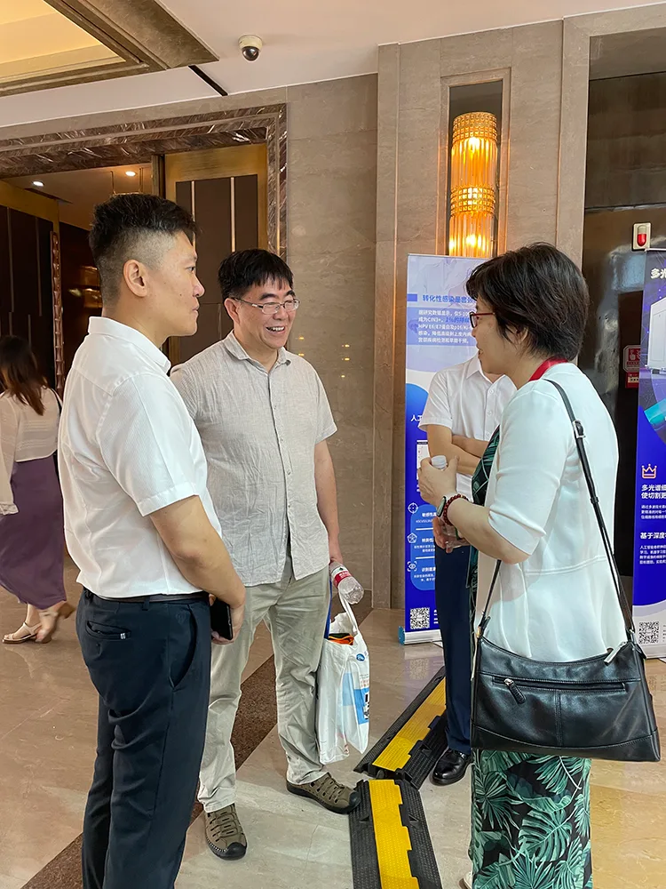 Group photo with experts during the exhibition